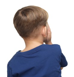 Photo of Little boy covering his eye on white background, back view