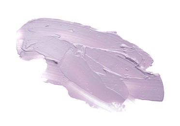 Strokes of purple color correcting concealer isolated on white