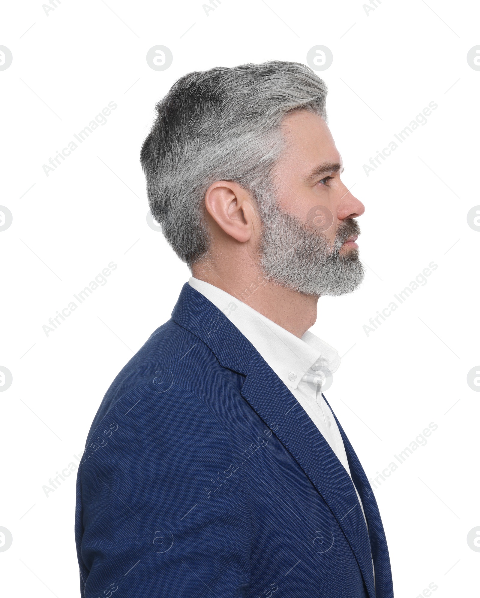 Photo of Mature businessman in stylish clothes posing on white background