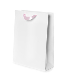 Photo of Paper shopping bag isolated on white. Mock up for design