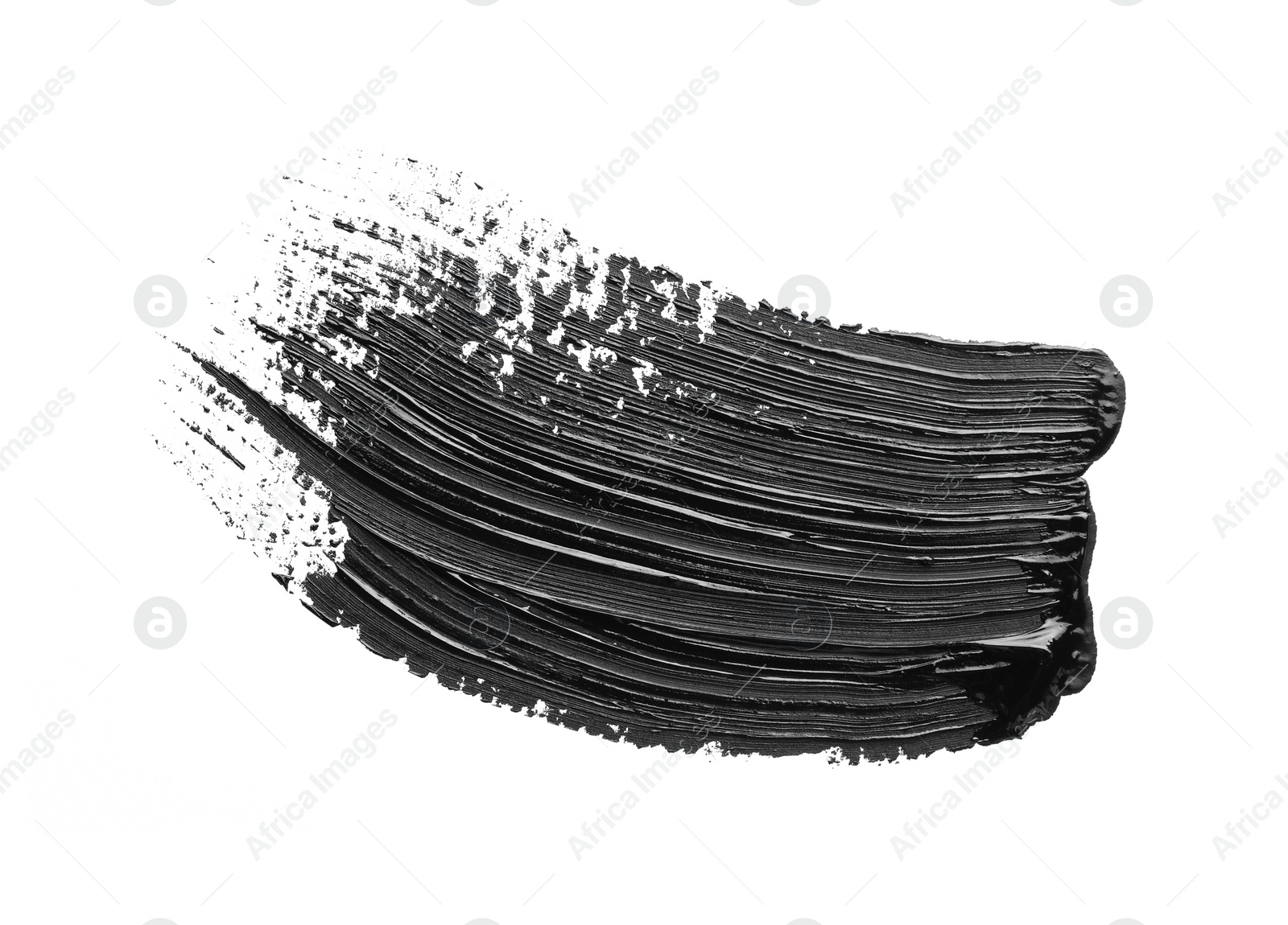 Photo of Brushstrokes of black oil paint on white background, top view