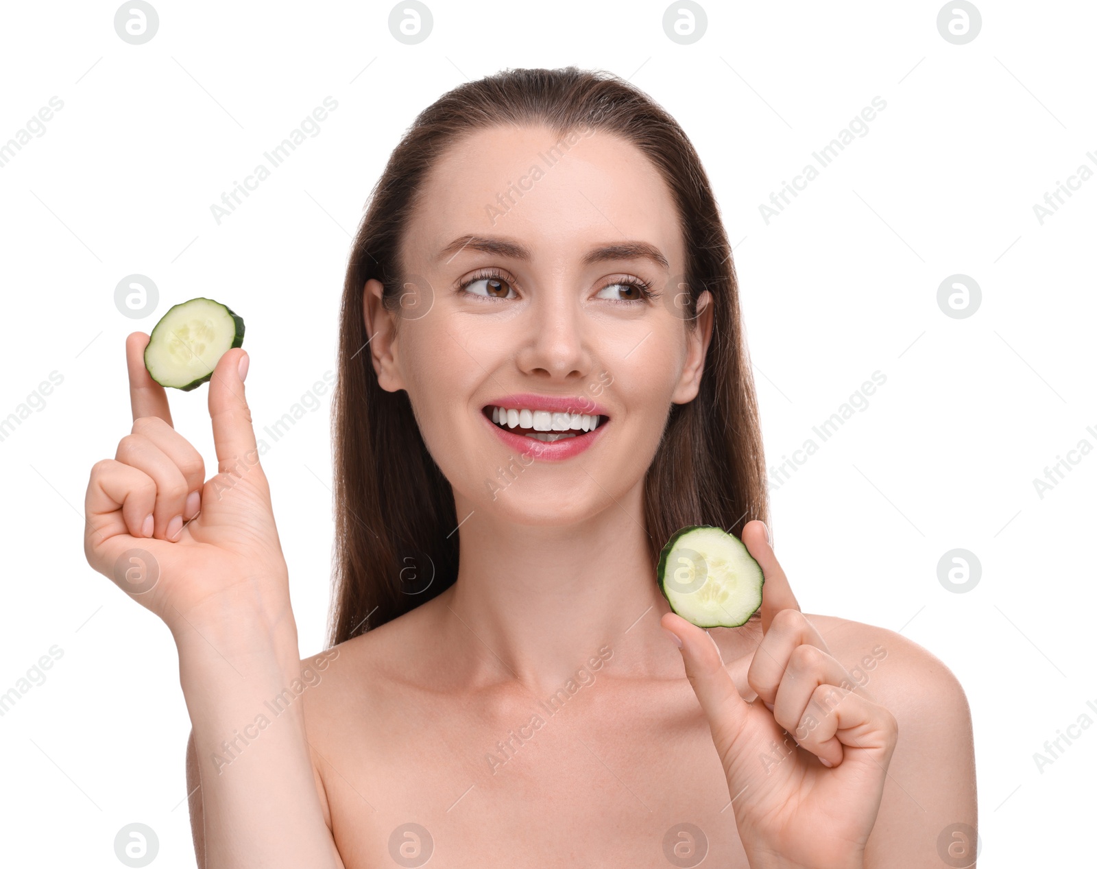 Photo of Beautiful woman with pieces of cucumber on white background