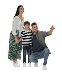 Photo of Little boy with his parents together on white background