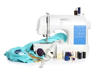 Photo of Modern sewing machine with light blue cloth and craft accessories isolated on white