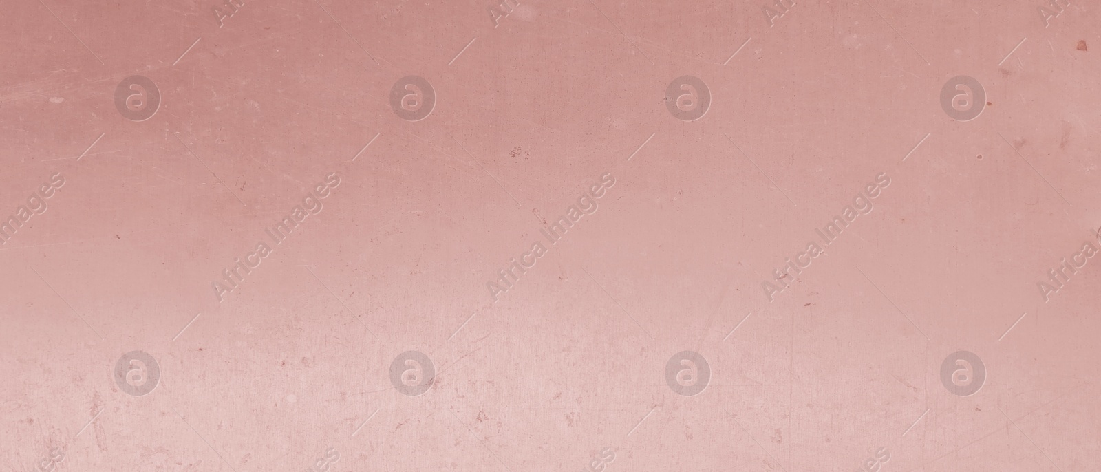 Image of Rose gold surface as background, closeup view