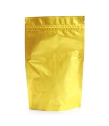 Photo of Foil bag with tea on white background