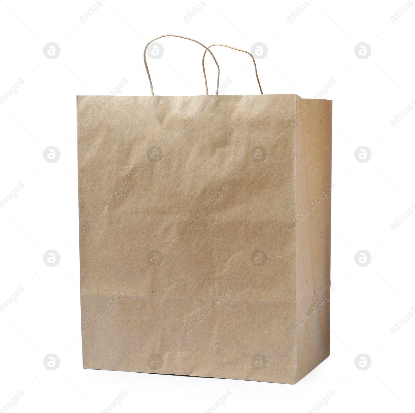 Photo of Kraft shopping paper bag isolated on white