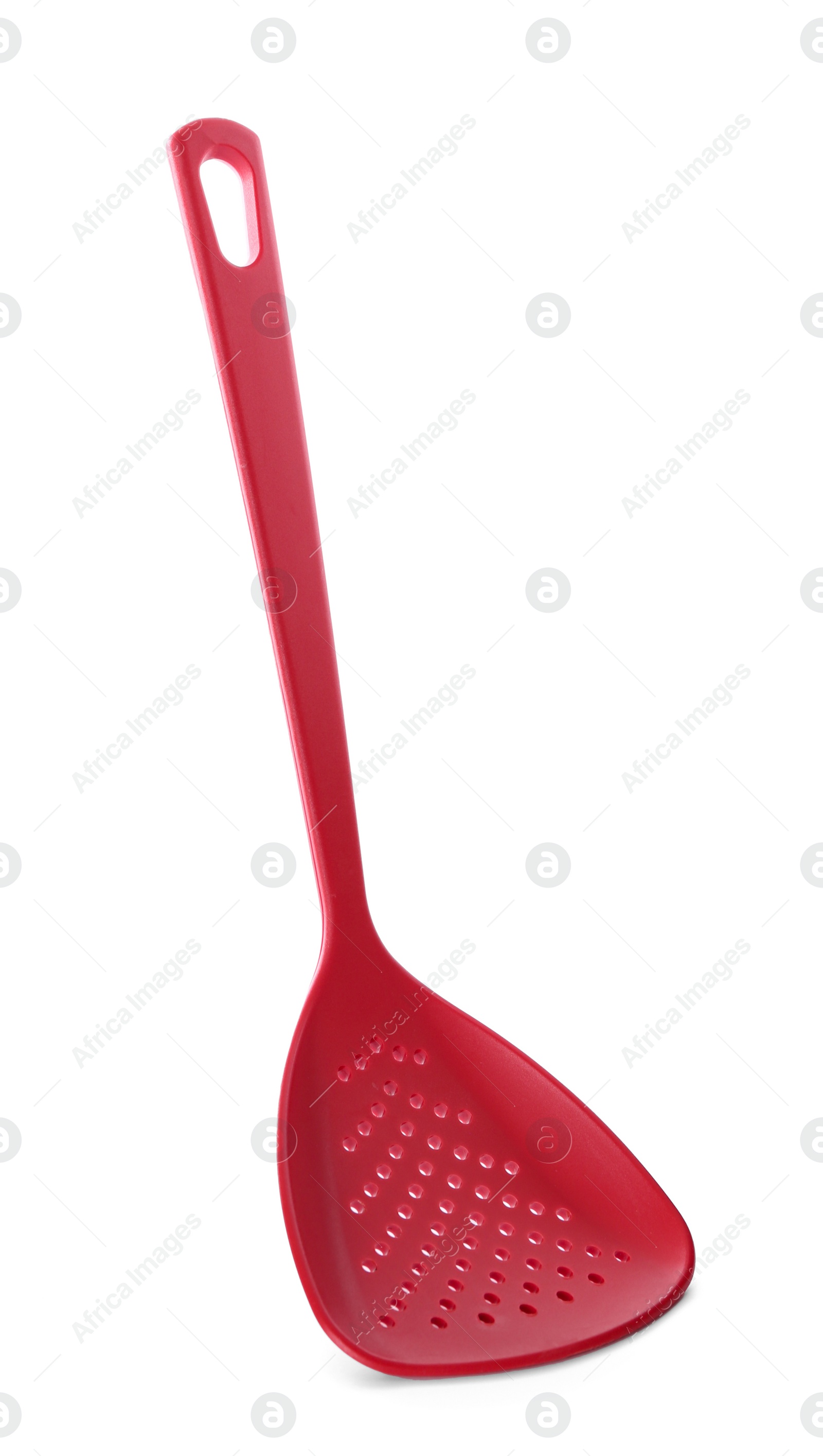 Photo of Color skimmer on white background. Kitchen utensils