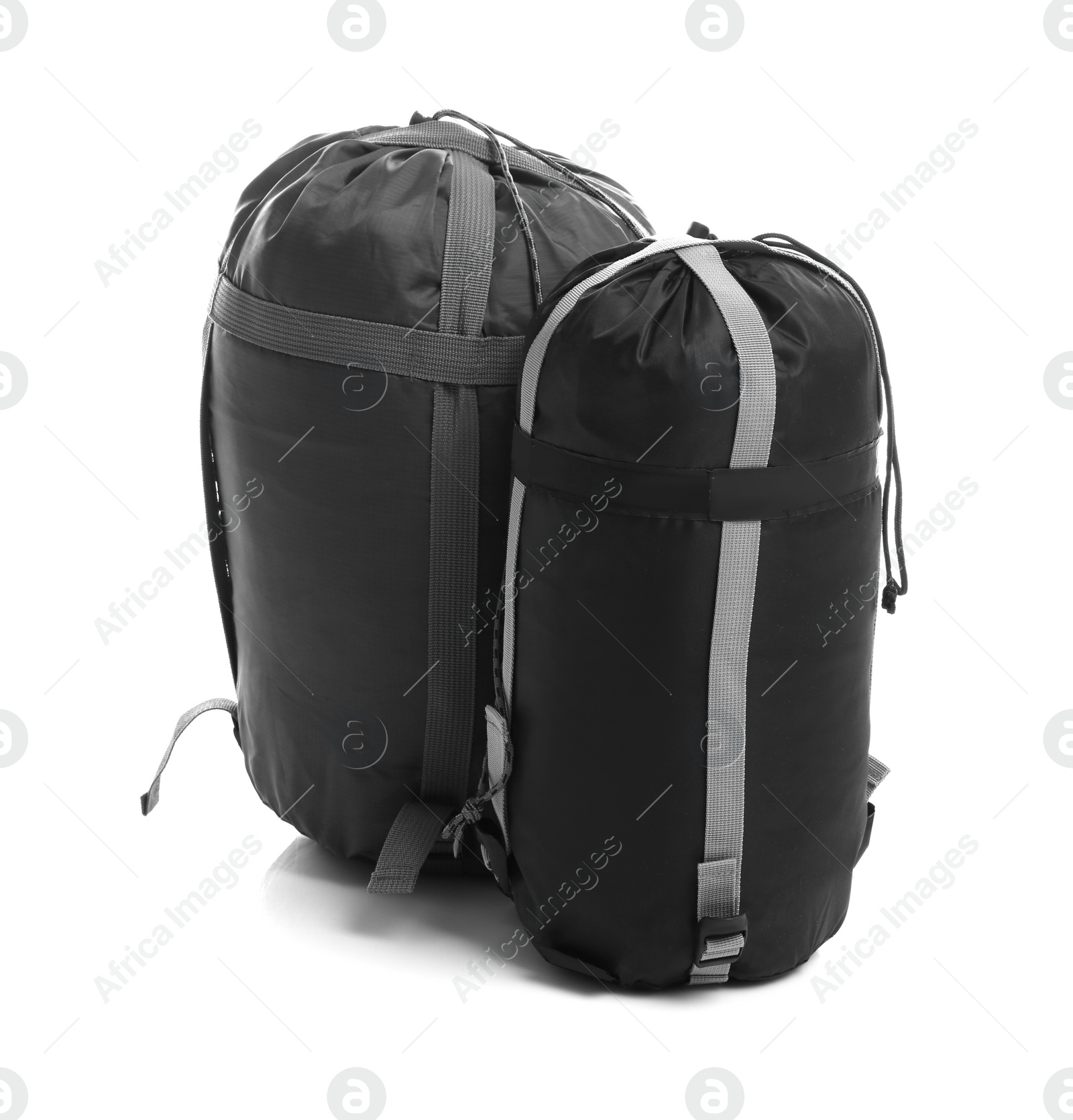 Photo of Sleeping bags on white background. Camping equipment