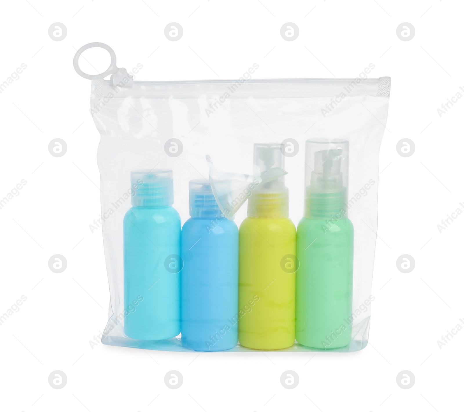 Photo of Cosmetic travel kit in plastic bag isolated on white. Bath accessories