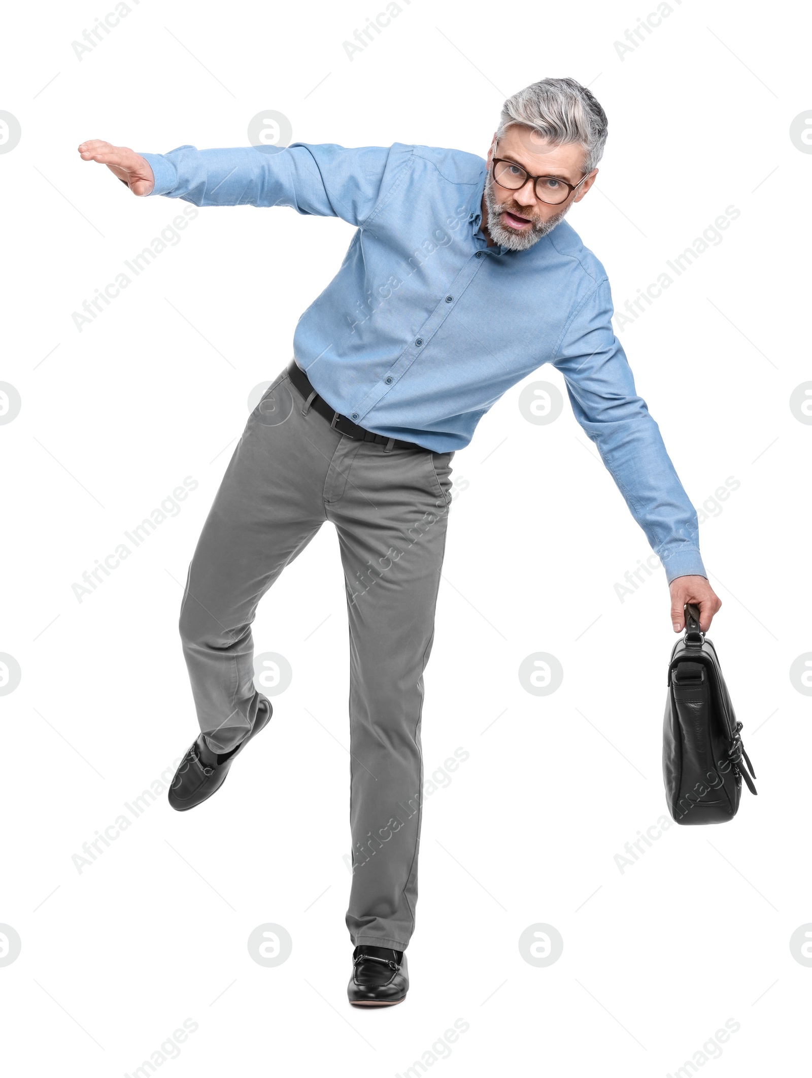 Photo of Mature businessman in stylish clothes with briefcase on white background