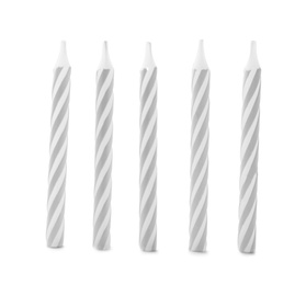 Silver striped birthday candles isolated on white