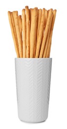 Delicious grissini sticks in glass on white background