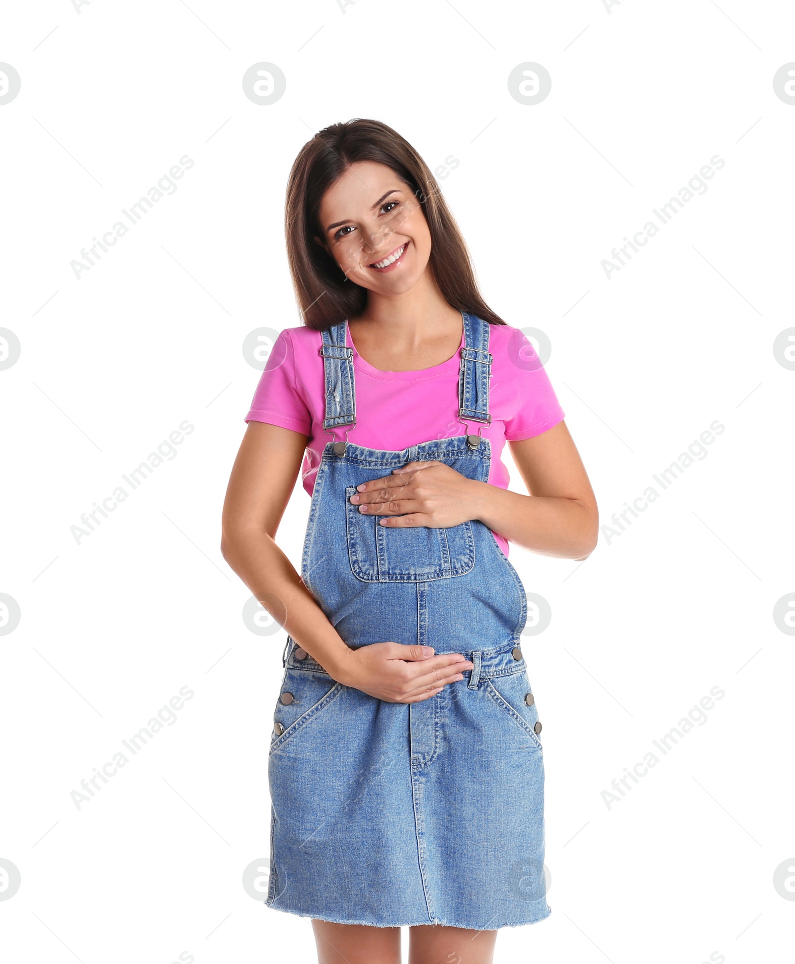 Photo of Happy pregnant woman posing on white background