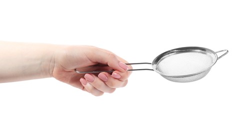 Woman with metal sieve on white background, closeup