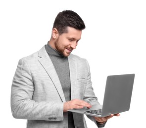 Photo of Handsome bearded businessman using laptop on white background