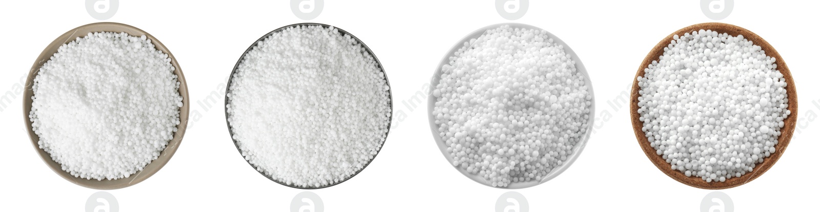 Image of Set with ammonium nitrate pellets in bowls on white background, top view. Mineral fertilizer