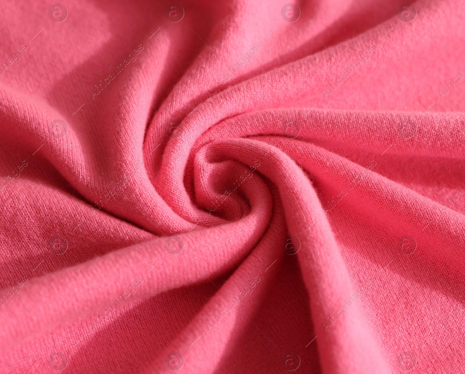 Photo of Beautiful pink fabric as background, closeup view