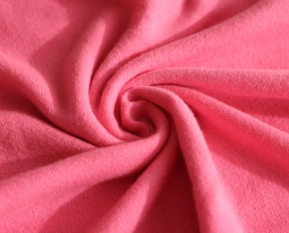 Beautiful pink fabric as background, closeup view