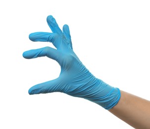 Photo of Doctor wearing light blue medical glove holding something on white background, closeup