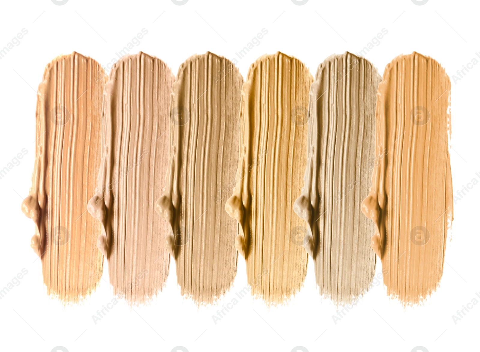 Image of Foundation of various shades for different skin tones isolated on white, top view. Set of samples