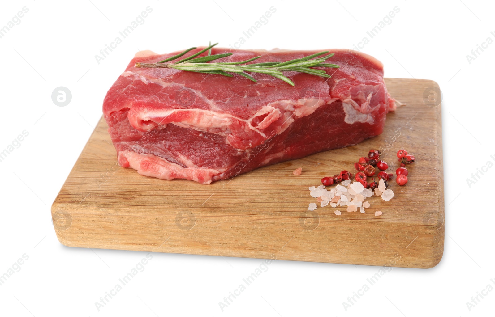 Photo of Board with steak of raw beef meat and spices isolated on white