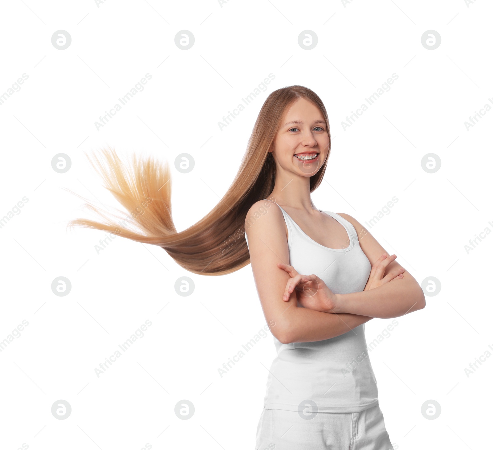 Photo of Teenage girl with strong healthy hair on white background