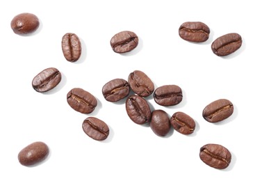 Many roasted coffee beans isolated on white, top view