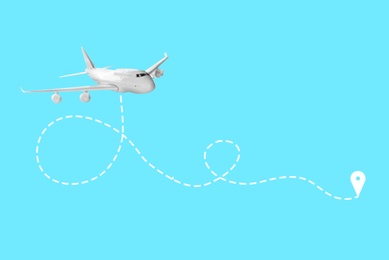 Flight direction illustration. Plane and pin connected by dashed line on light blue background