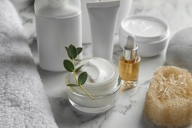 Composition with different body care products on table