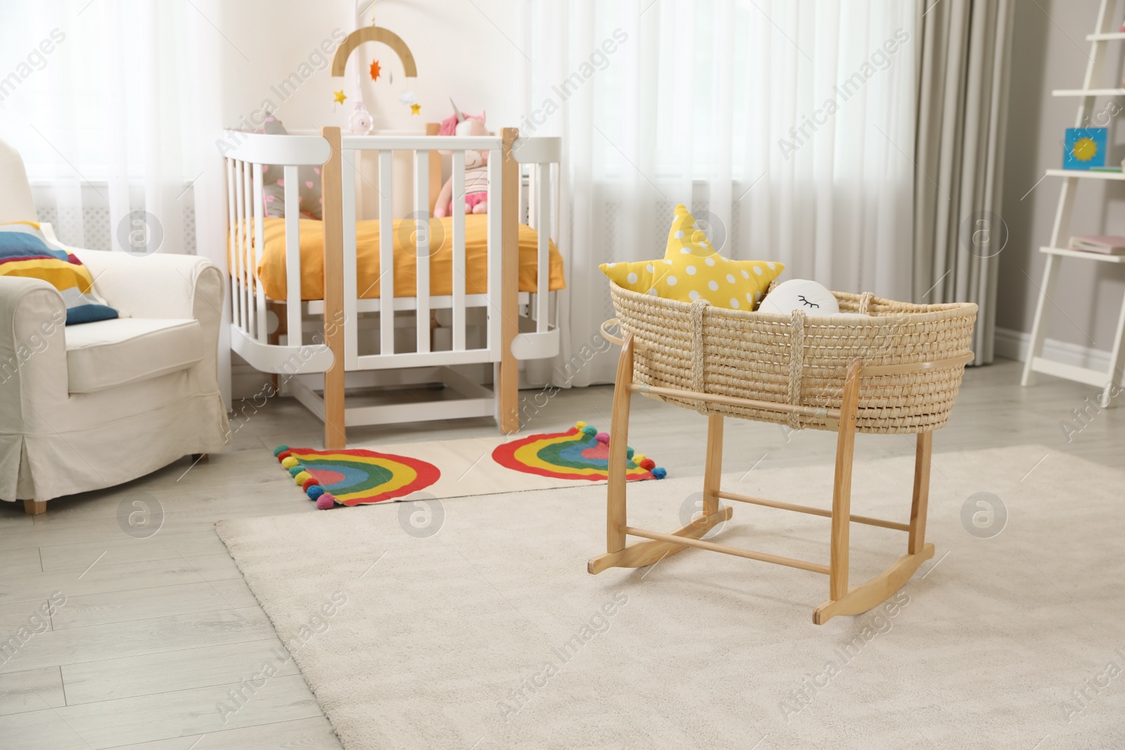 Photo of Beautiful baby room interior with stylish furniture