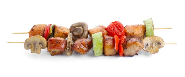 Photo of Delicious shish kebabs with mushrooms, tomato and zucchini isolated on white