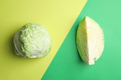 Photo of Flat lay composition with ripe cabbages on color background