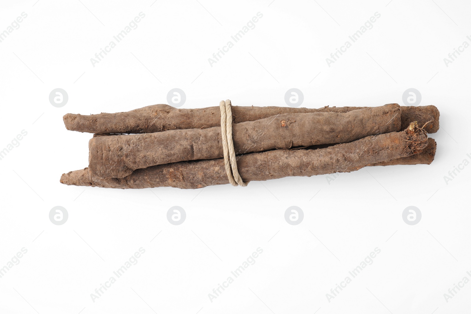 Photo of Raw salsify roots on white background, top view