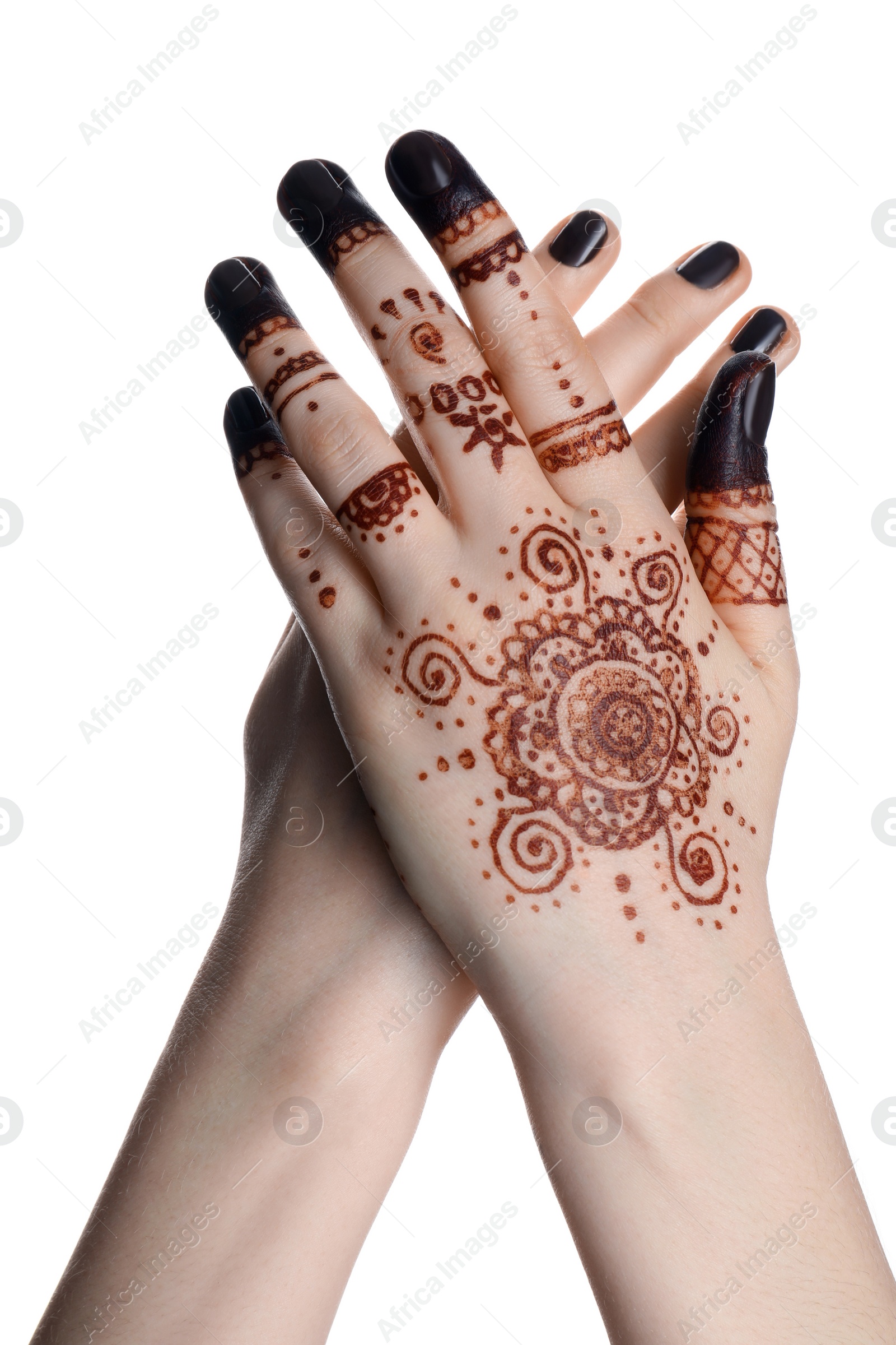 Photo of Woman with henna tattoo on hand against white background, closeup. Traditional mehndi ornament