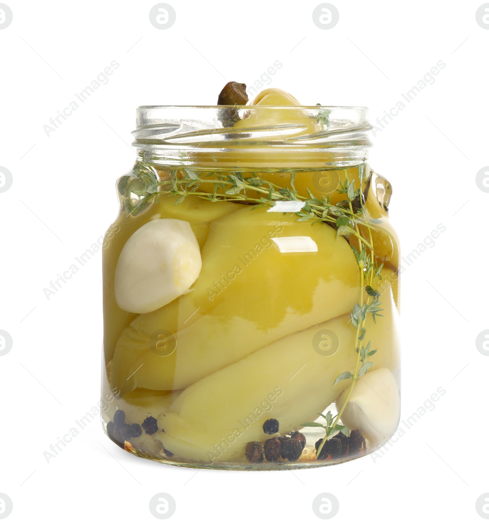 Photo of Glass jar with pickled peppers isolated on white