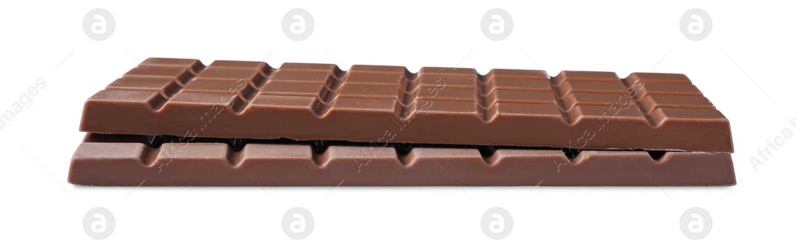 Photo of Delicious milk chocolate bars isolated on white