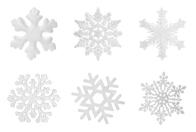 Image of Set of beautiful decorative snowflakes on white background