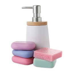 Photo of Different soap bars and dispenser on white background