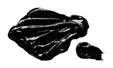 Photo of Blots of black paint on white background, top view