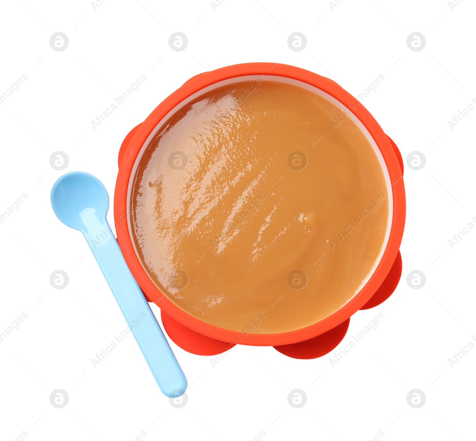 Photo of Tasty baby food in bowl and spoon isolated on white, top view