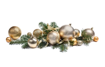 Many golden Christmas balls, ribbon and fir twigs isolated on white