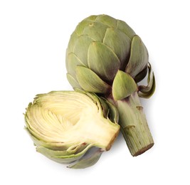 Photo of Cut and whole fresh artichokes on white background