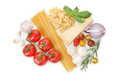 Photo of Different types of pasta and ingredients on white background, top view