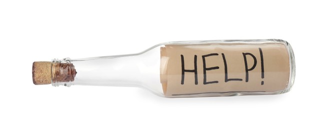 Message Help in corked glass bottle isolated on white