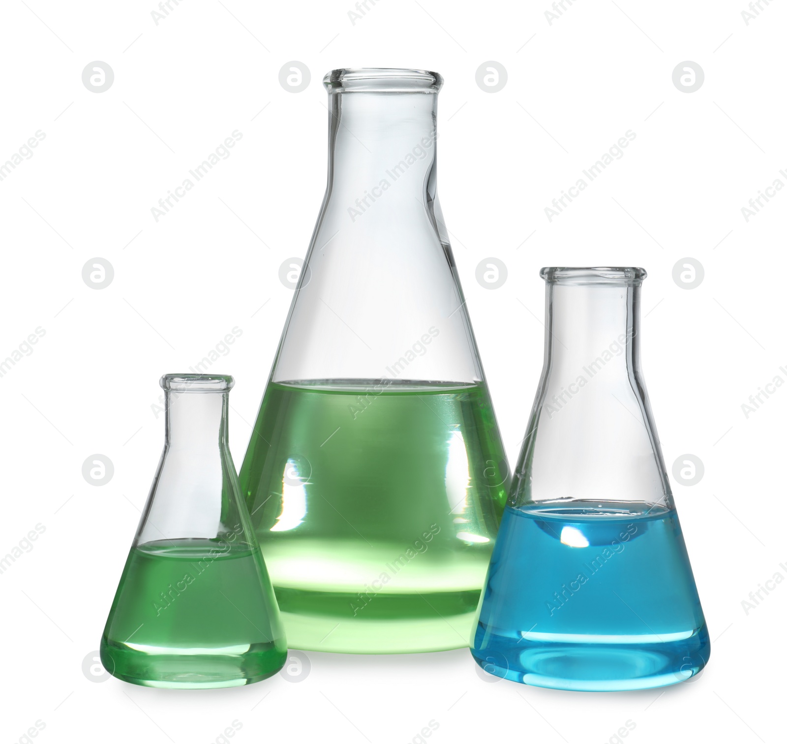 Photo of Glassware with liquids isolated on white. Laboratory analysis