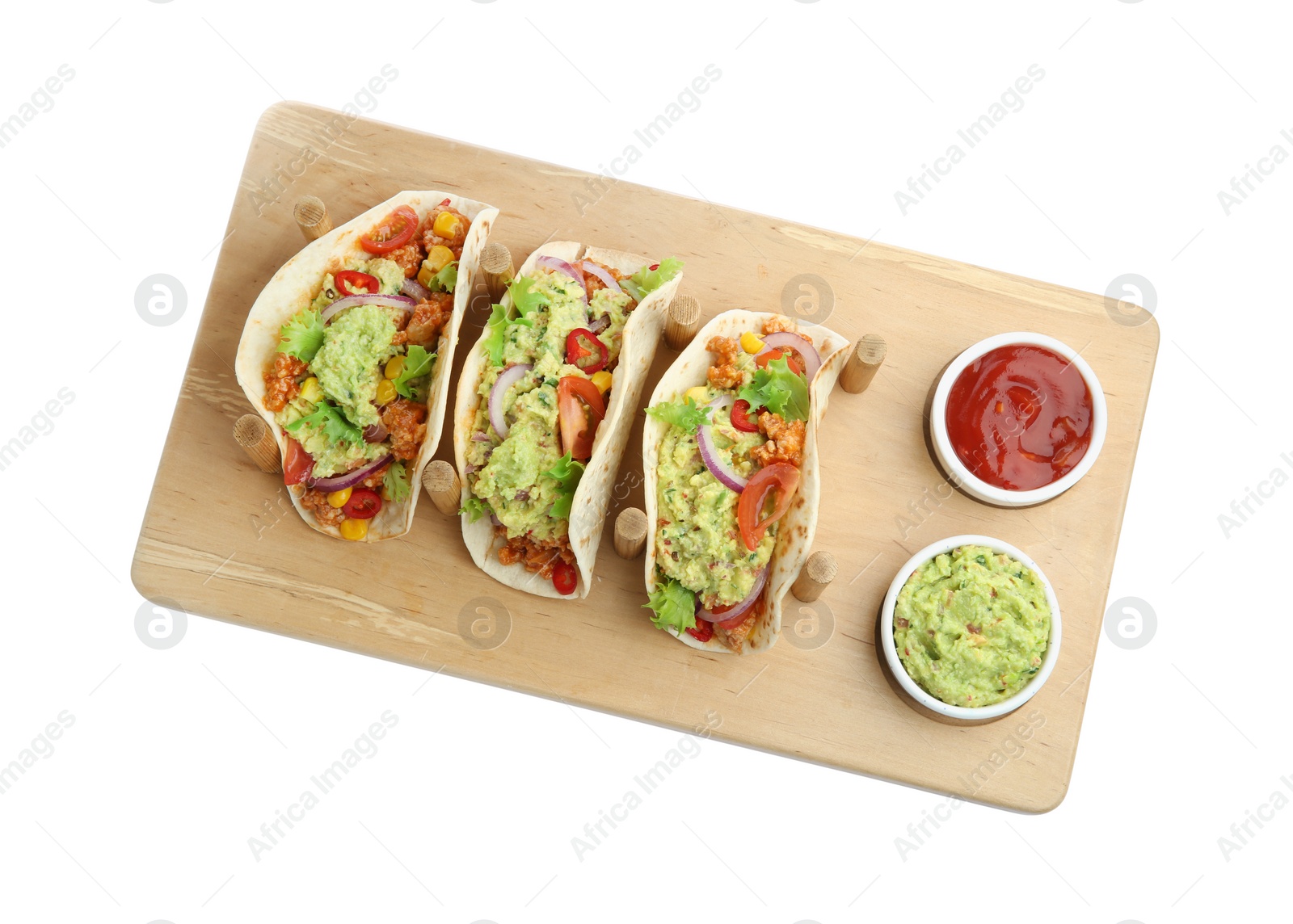 Photo of Delicious tacos with guacamole and vegetables isolated on white, top view