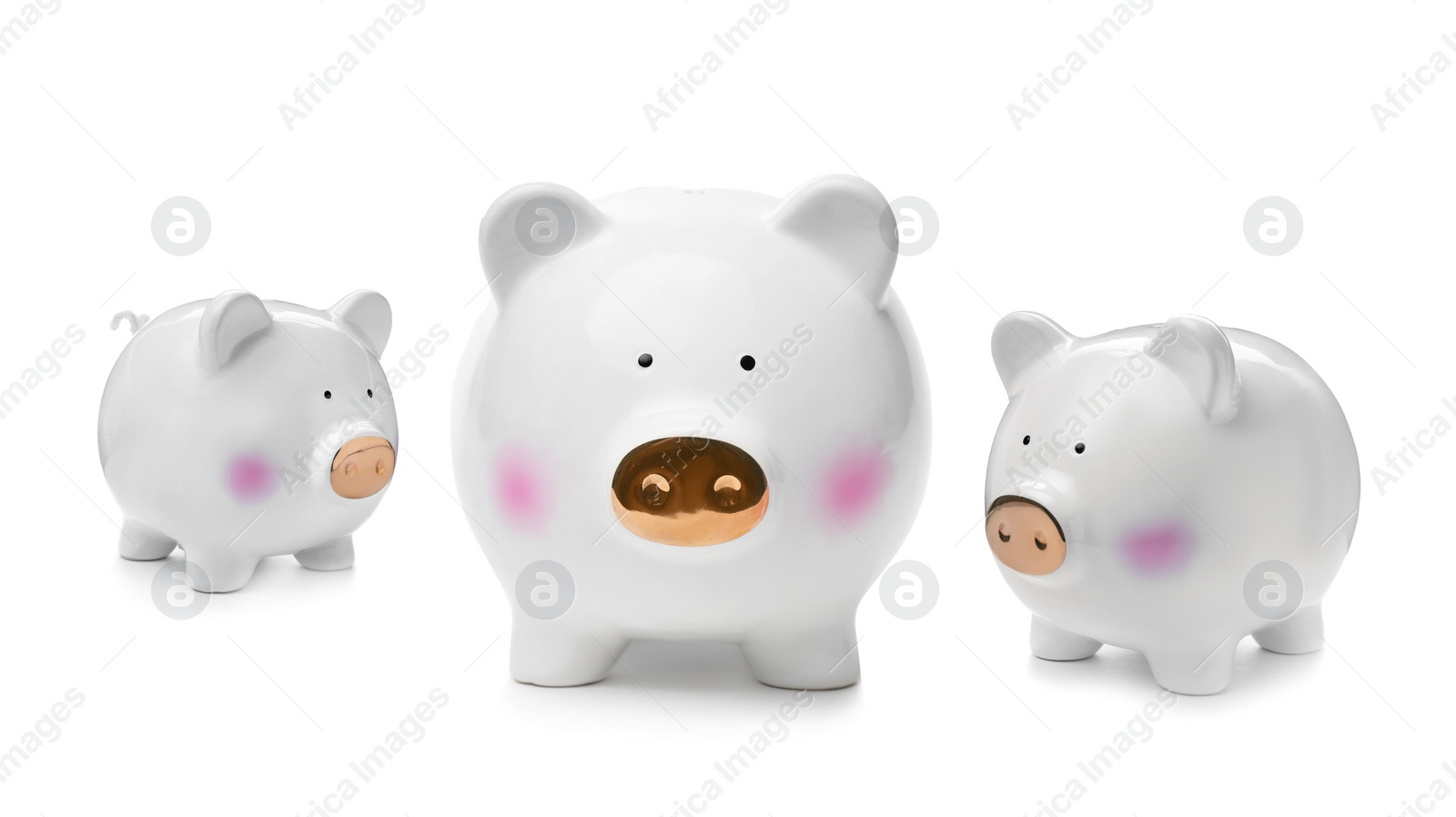 Image of Cute ceramic piggy banks on white background