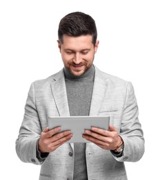 Handsome bearded businessman using tablet on white background