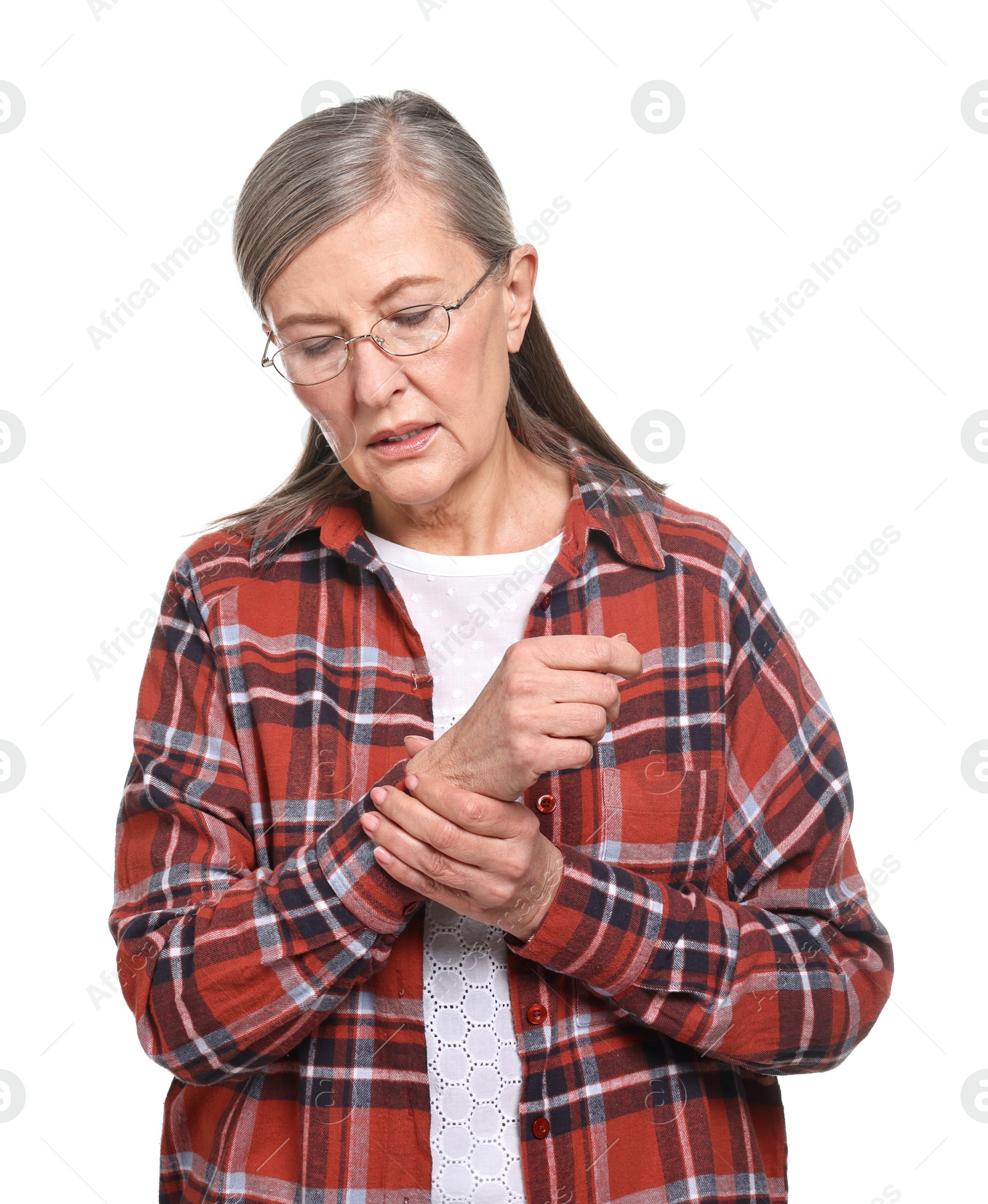 Photo of Arthritis symptoms. Woman suffering from pain in wrist on white background